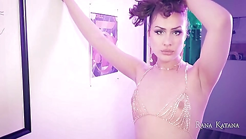 Busty brunette is fucking herself with a large dildo