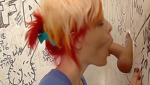 Busty tranny gets a load of creampie in the glories hole