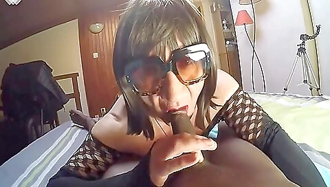 Ebony babe with a sexy dress is deepthroating a big dick