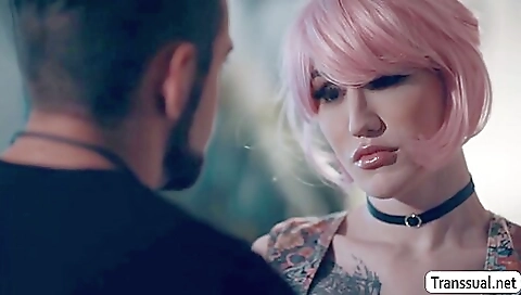 Sexy shemale with a tattooed ass gets fucked in a hardcore scene