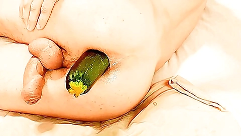 Amateur slut enjoys getting her ass filled with zucchini